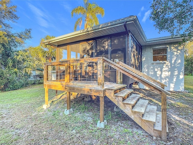 exterior space featuring a sunroom