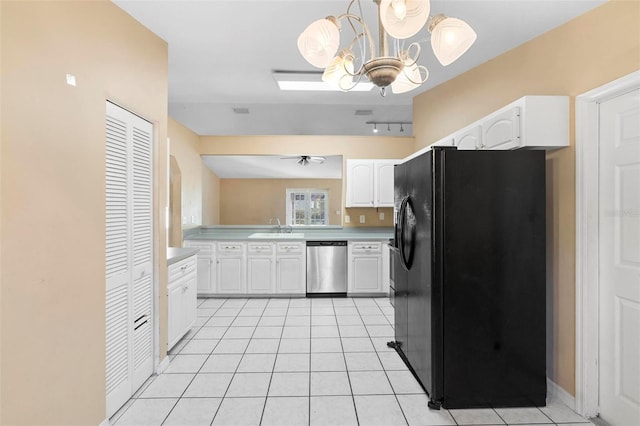 kitchen featuring black refrigerator with ice dispenser, white cabinets, sink, stainless steel dishwasher, and decorative light fixtures