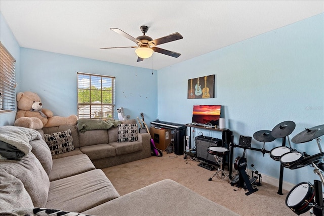 living room featuring light carpet and ceiling fan