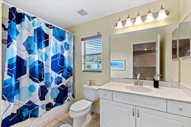 full bathroom featuring tile patterned floors, vanity, shower / bath combo, and toilet