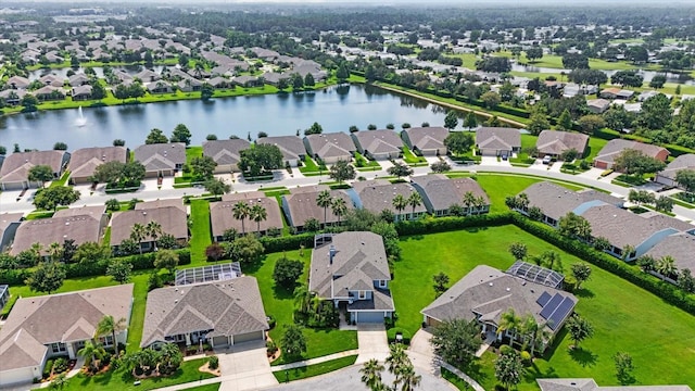 bird's eye view with a water view