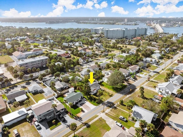 bird's eye view with a water view