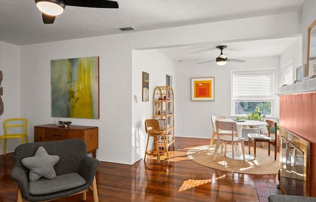 interior space featuring dark hardwood / wood-style floors and ceiling fan