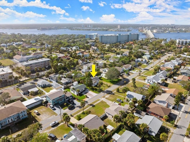 birds eye view of property featuring a water view