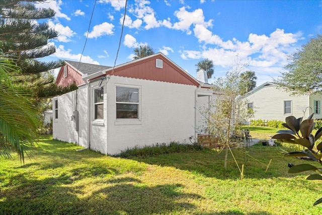 view of home's exterior featuring a lawn