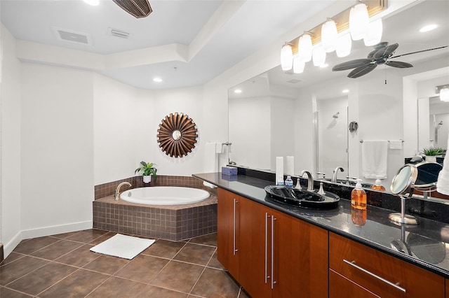 bathroom featuring tile patterned flooring, ceiling fan, plus walk in shower, and vanity