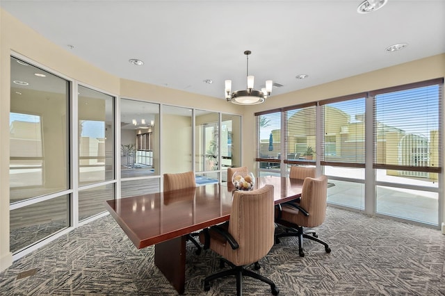 interior space with carpet and an inviting chandelier