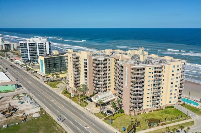 aerial view featuring a water view and a beach view