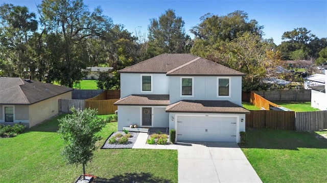 front of property with a front lawn and a garage