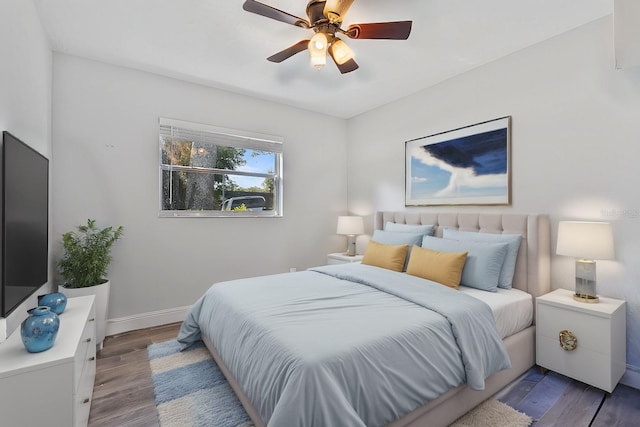 bedroom with ceiling fan and light wood-type flooring