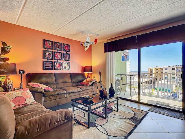 tiled living room with a textured ceiling