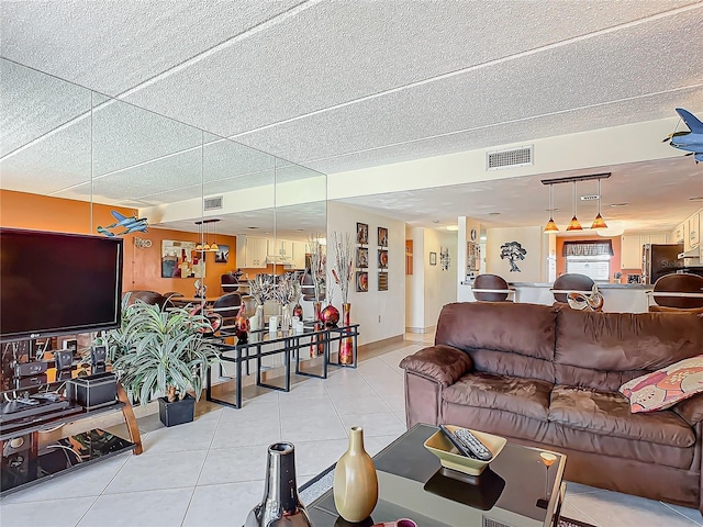 living room with light tile patterned floors