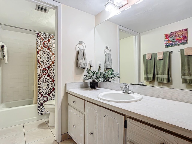 full bathroom featuring tile patterned flooring, vanity, shower / tub combo with curtain, and toilet