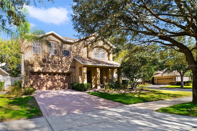 view of front of property with a garage