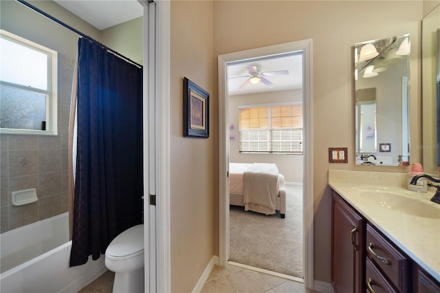 full bathroom with ceiling fan, shower / bathtub combination with curtain, tile patterned floors, toilet, and vanity