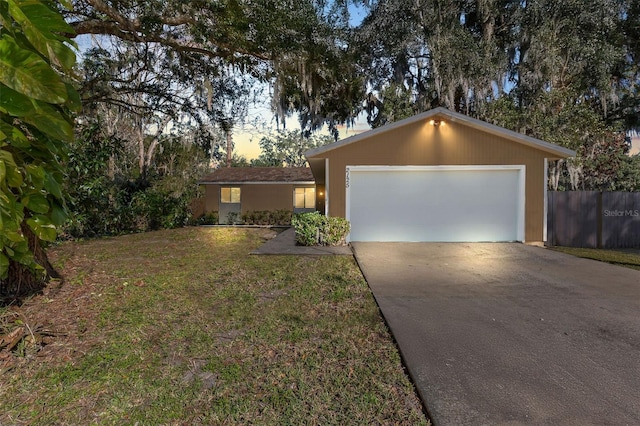 single story home featuring a garage