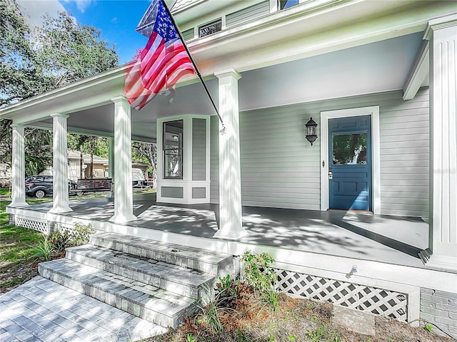 entrance to property with a porch