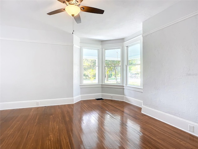 unfurnished room featuring hardwood / wood-style flooring and ceiling fan