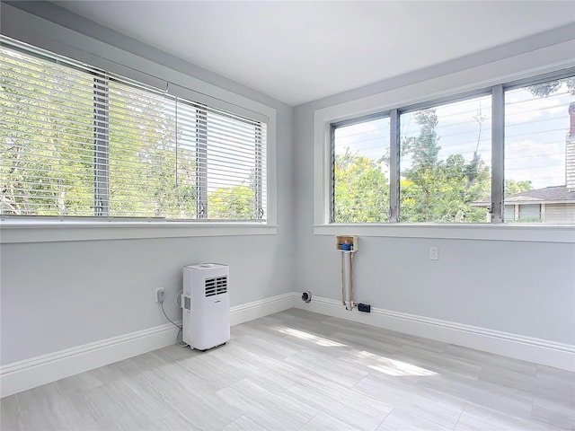 spare room with a wealth of natural light