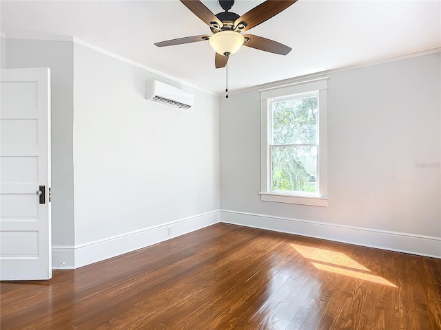 unfurnished room featuring dark hardwood / wood-style floors, an AC wall unit, and crown molding