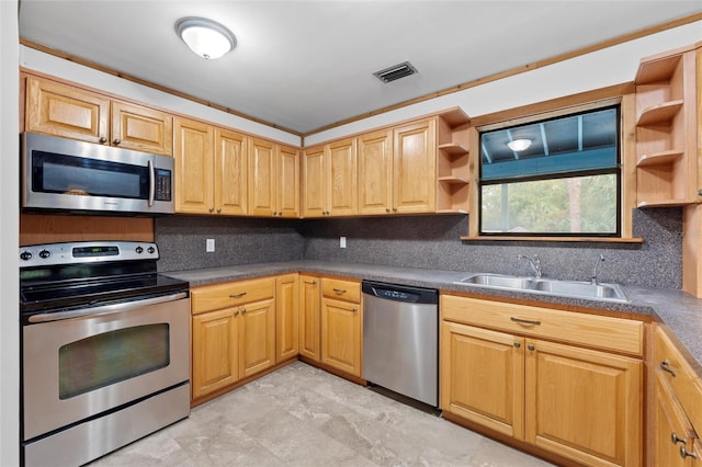 kitchen featuring tasteful backsplash, sink, stainless steel appliances, and ornamental molding