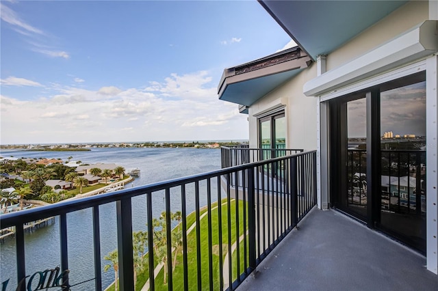 balcony featuring a water view