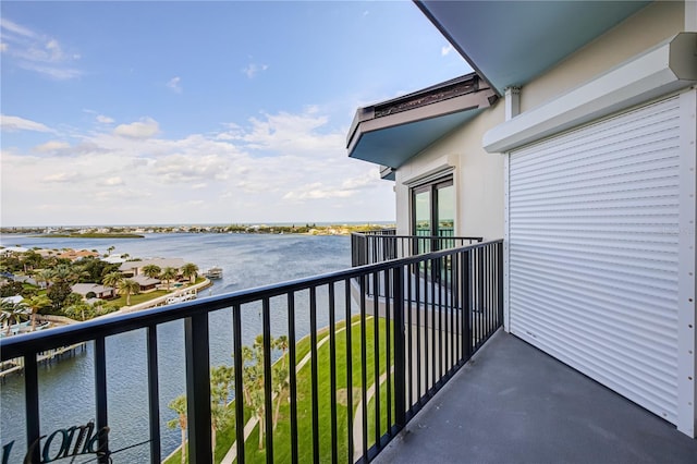 balcony featuring a water view