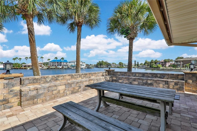 view of patio / terrace with a water view