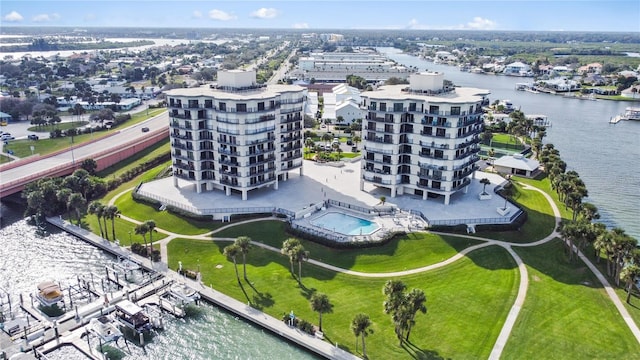 birds eye view of property featuring a water view