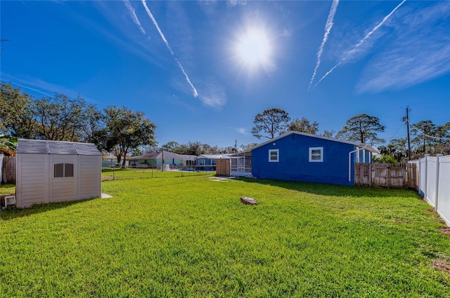 view of yard with a storage shed