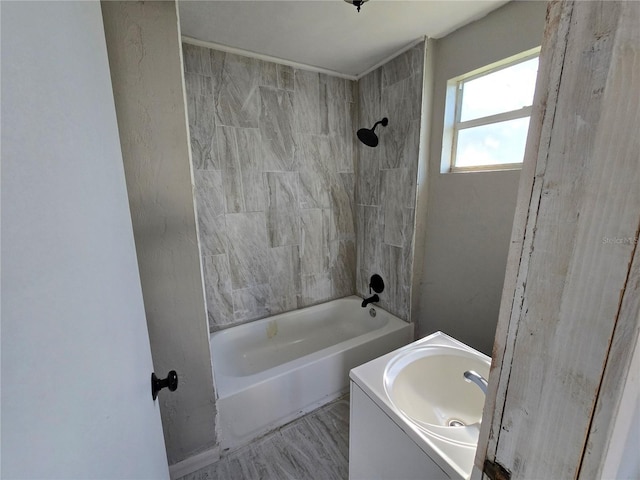 bathroom featuring shower / bathing tub combination and vanity