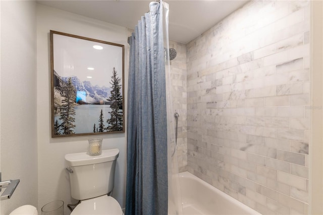 bathroom with shower / bath combination with curtain and toilet