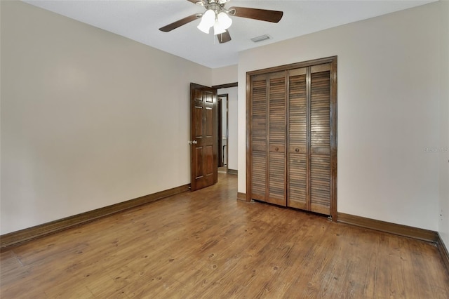 unfurnished bedroom featuring a closet, ceiling fan, and light hardwood / wood-style floors