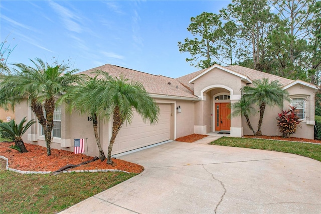 view of front of property featuring a garage