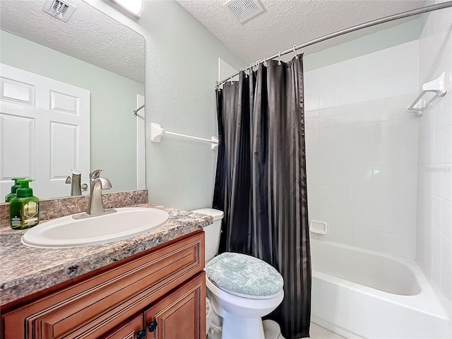 full bathroom featuring vanity, shower / bath combo, a textured ceiling, and toilet