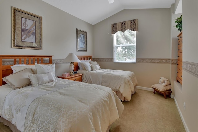 carpeted bedroom featuring vaulted ceiling