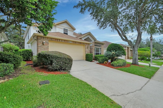 view of front of house featuring a garage and a front lawn