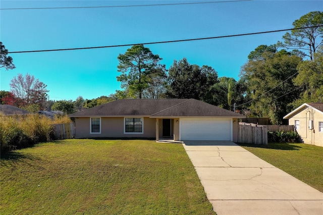 ranch-style home with a front yard and a garage