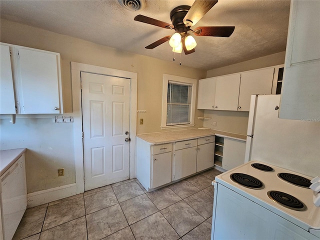 kitchen with a textured ceiling, white appliances, white cabinetry, and ceiling fan