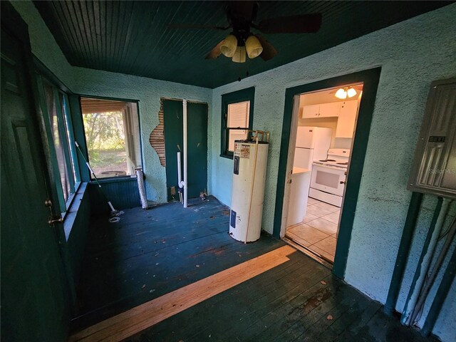 interior space featuring water heater and wood-type flooring