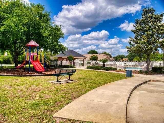 view of jungle gym with a yard