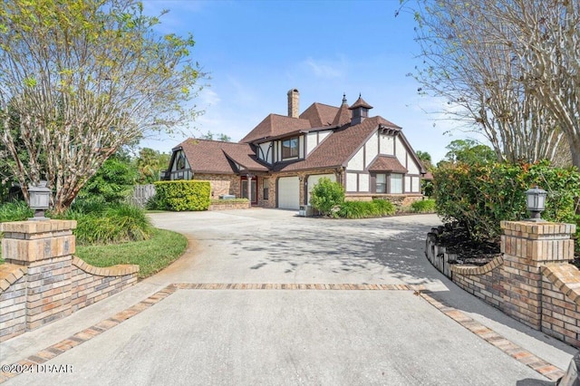 tudor house with a garage