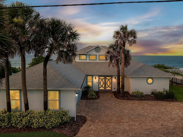 view of front of home featuring a water view