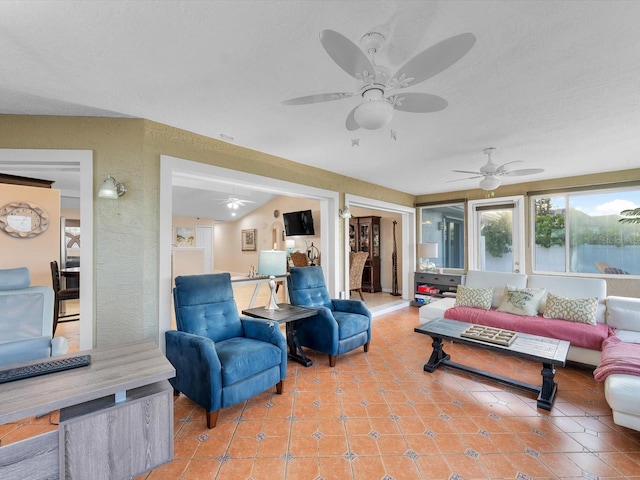 tiled living room featuring vaulted ceiling