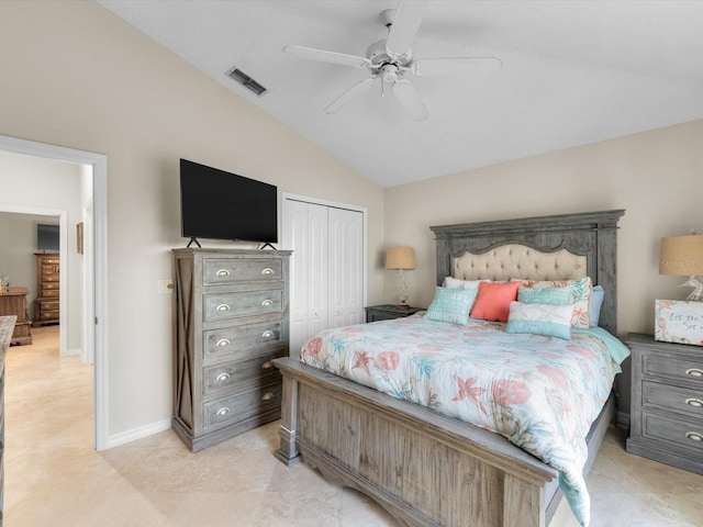 bedroom featuring ceiling fan, vaulted ceiling, and a closet