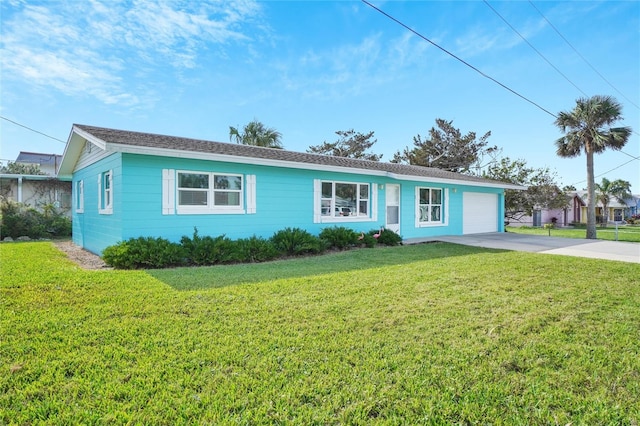 single story home with a garage and a front lawn