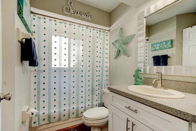 full bathroom featuring vanity, shower / bathtub combination, and toilet