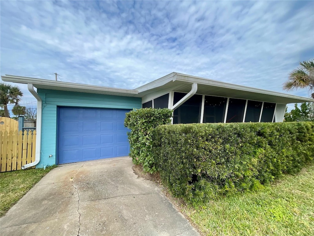 ranch-style house featuring a garage