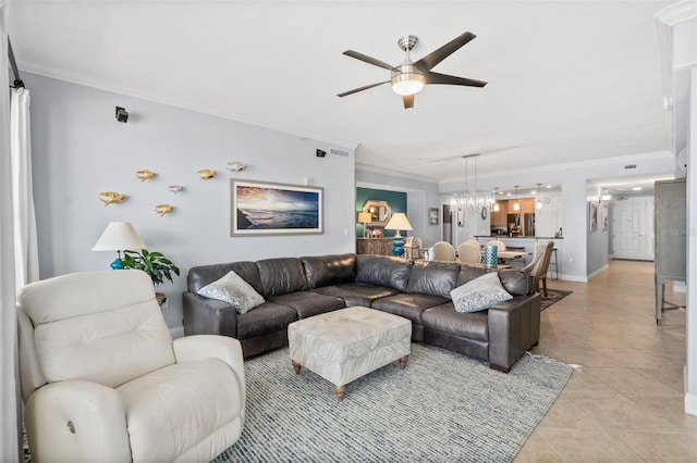 tiled living room featuring ceiling fan with notable chandelier and ornamental molding