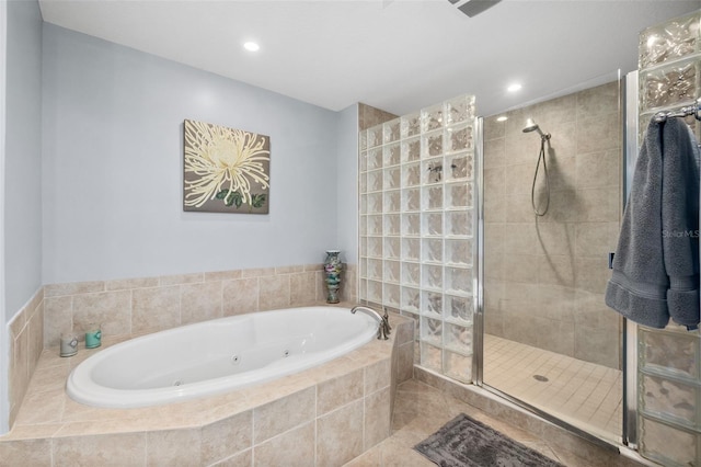 bathroom featuring tile patterned flooring and plus walk in shower